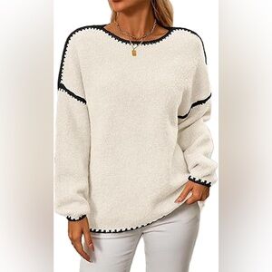 Cozy Cream Sweater with Black Accents